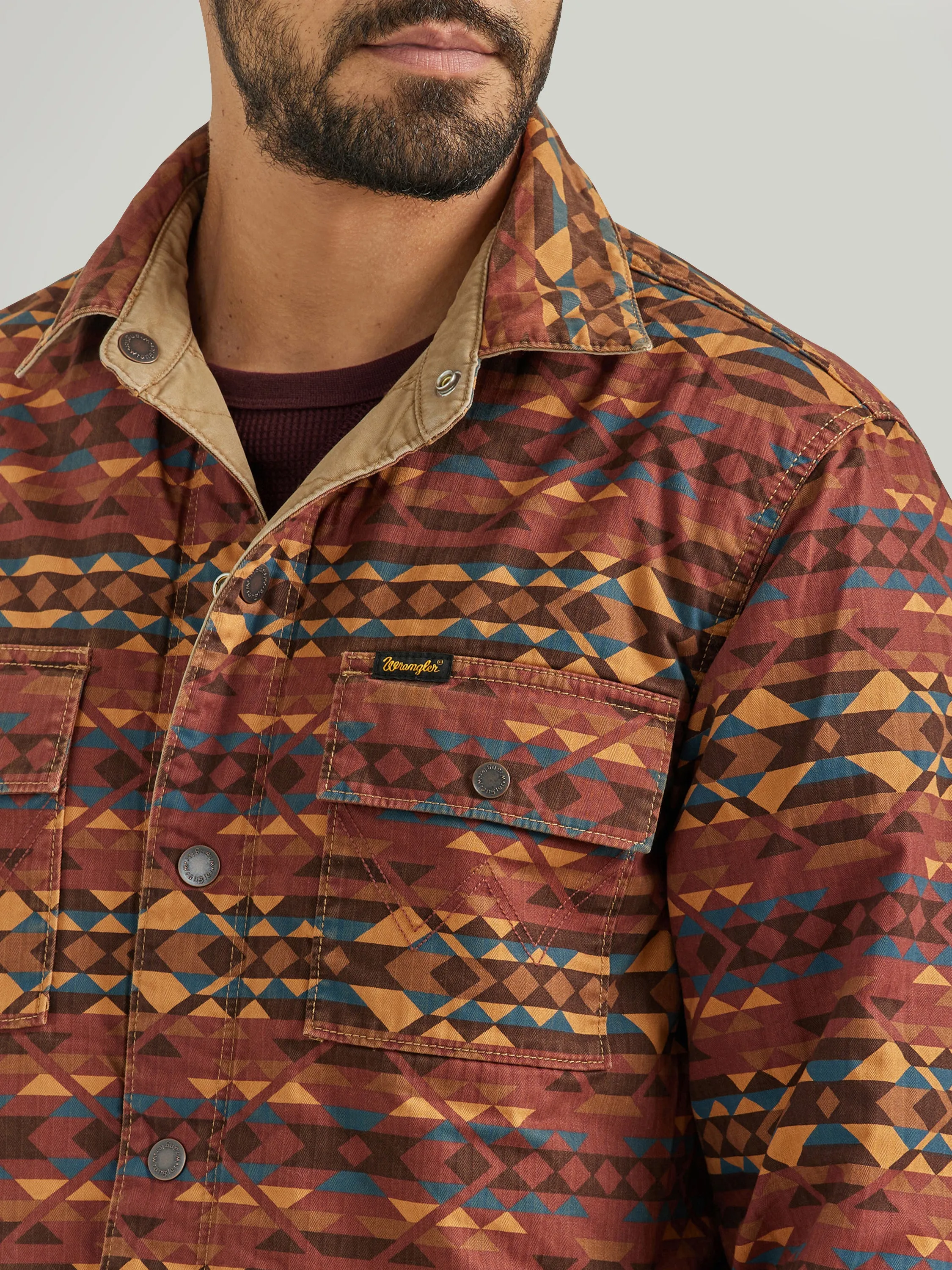 Wrangler Men's Solid Tan Quilted Western Jacket that Reverses to Bright Southwest Print